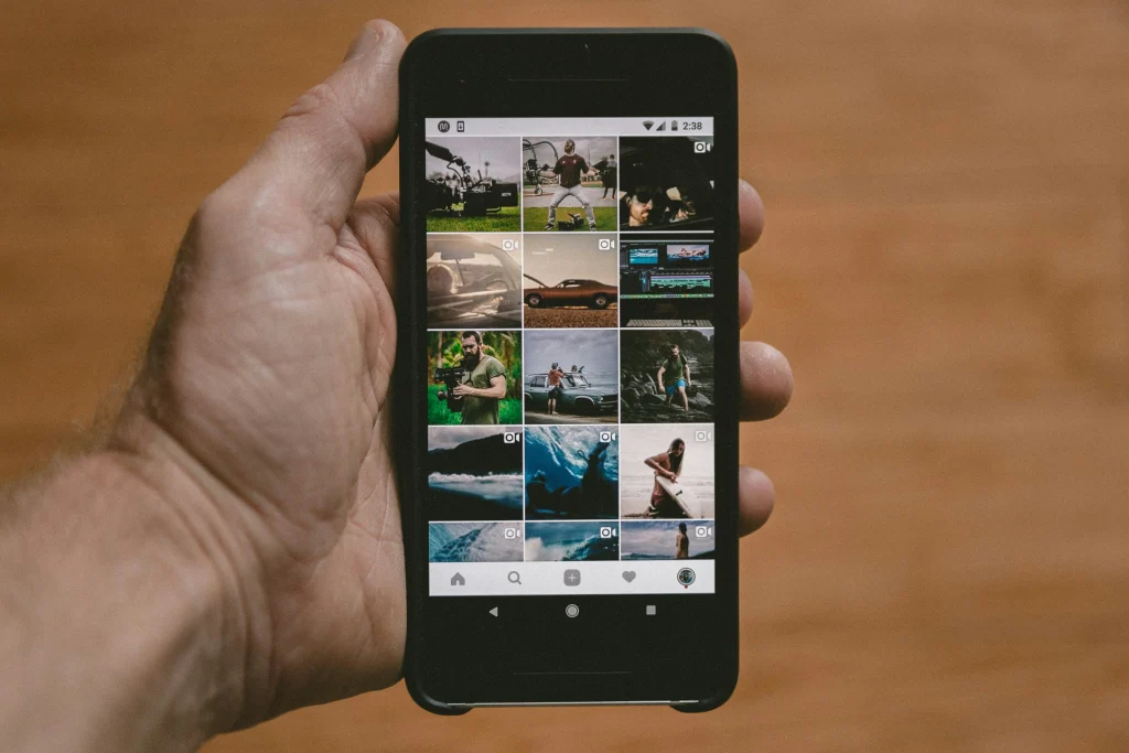 Photo gallery on a smartphone with images ready for HEIC to PNG conversion.